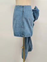 High-waist blue denim mini skirt with 3D flower design and asymmetric drape – women’s streetwear fashion