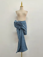 High-waist blue denim mini skirt with 3D flower design and asymmetric drape – women’s streetwear fashion