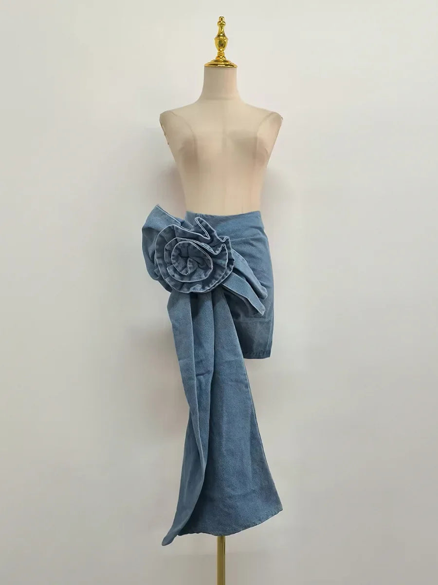 High-waist blue denim mini skirt with 3D flower design and asymmetric drape – women’s streetwear fashion