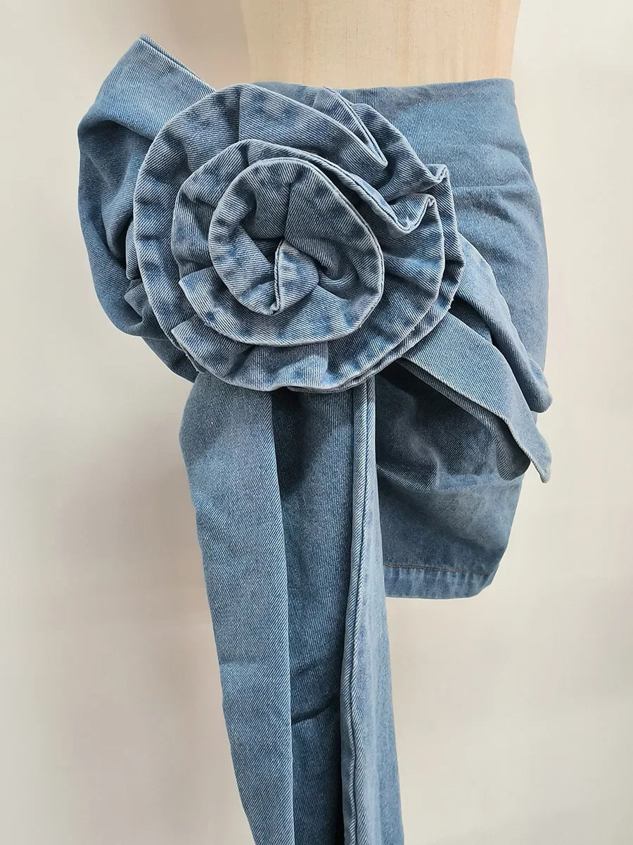 High-waist blue denim mini skirt with 3D flower design and asymmetric drape – women’s streetwear fashion