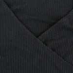 Black ribbed knit long sleeve V-neck bodycon mini dress with ruffle hem