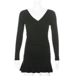 Black ribbed knit long sleeve V-neck bodycon mini dress with ruffle hem