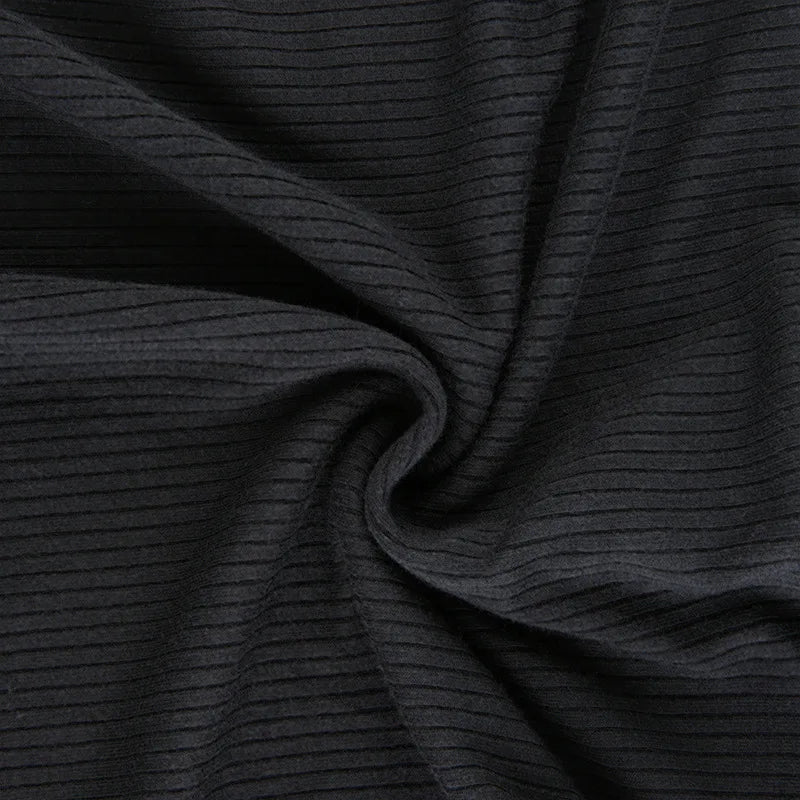 Black ribbed knit long sleeve V-neck bodycon mini dress with ruffle hem