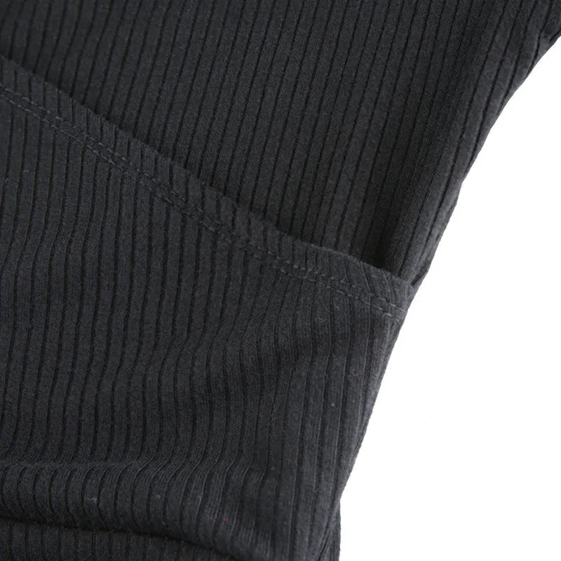 Black ribbed knit long sleeve V-neck bodycon mini dress with ruffle hem