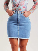 Light blue women’s denim mini skirt with raw hem, button closure, and front pockets – slim fit stretchy summer jeans skirt